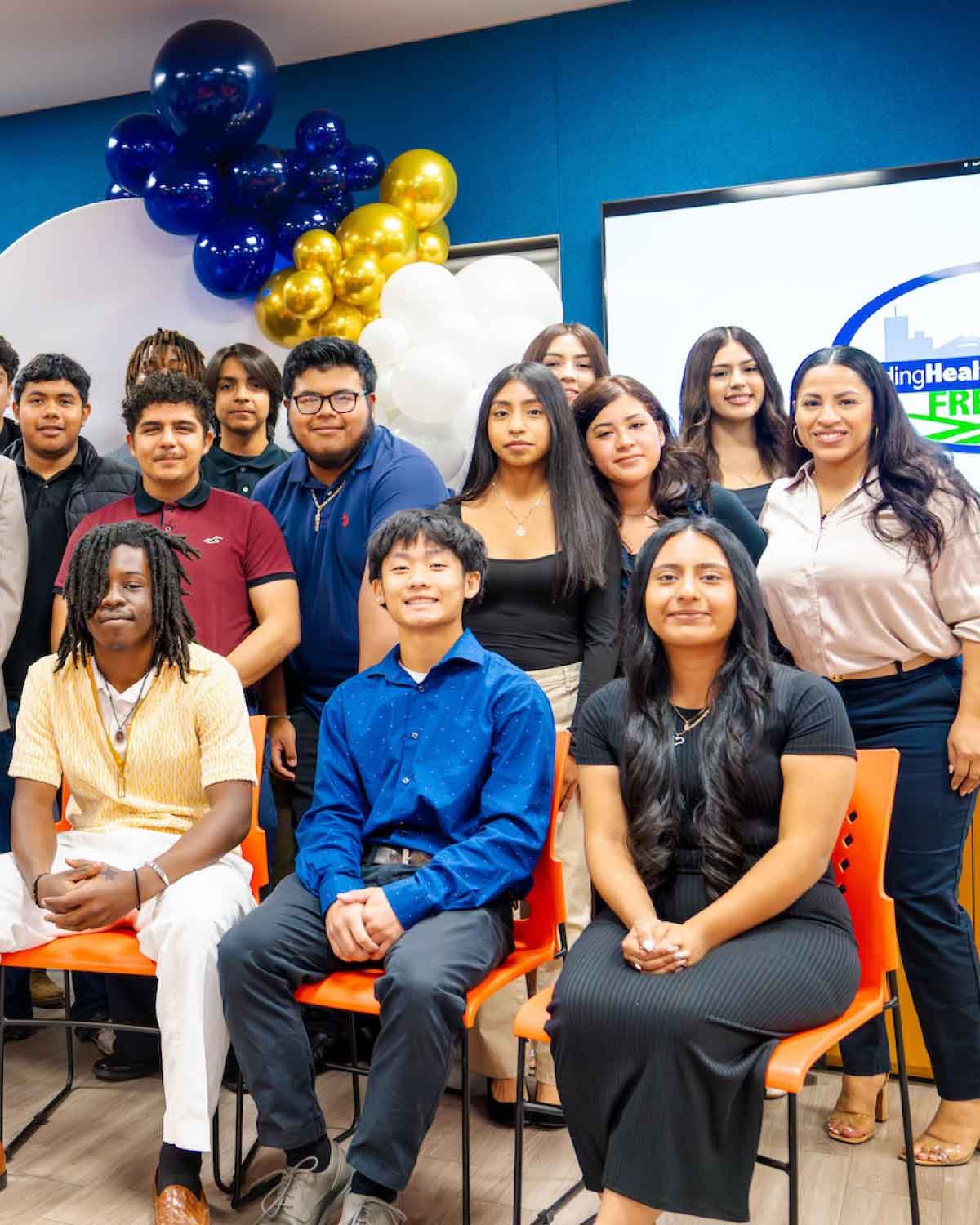 A full-group photo of Fresno BHC Youth Internships Program participants and mentors, celebrating the accomplishments of diverse young leaders and inspiring others to join the program.