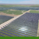 Aerial view of solar panels covering former farmland in West Fresno County, part of the Darden Clean Energy Project powering California’s renewable energy future.