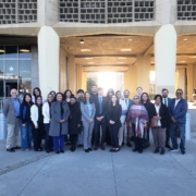 Did Caltrans Shortchange South Fresno? Judge Weighs Highway 99 Expansion Lawsuit A wide group portrait of about twenty people of diverse ages and backgrounds standing in front of a modern "Court House Entrance." They are dressed in a mix of professional and business-casual attire. The courthouse features a unique concrete honeycomb-style facade.