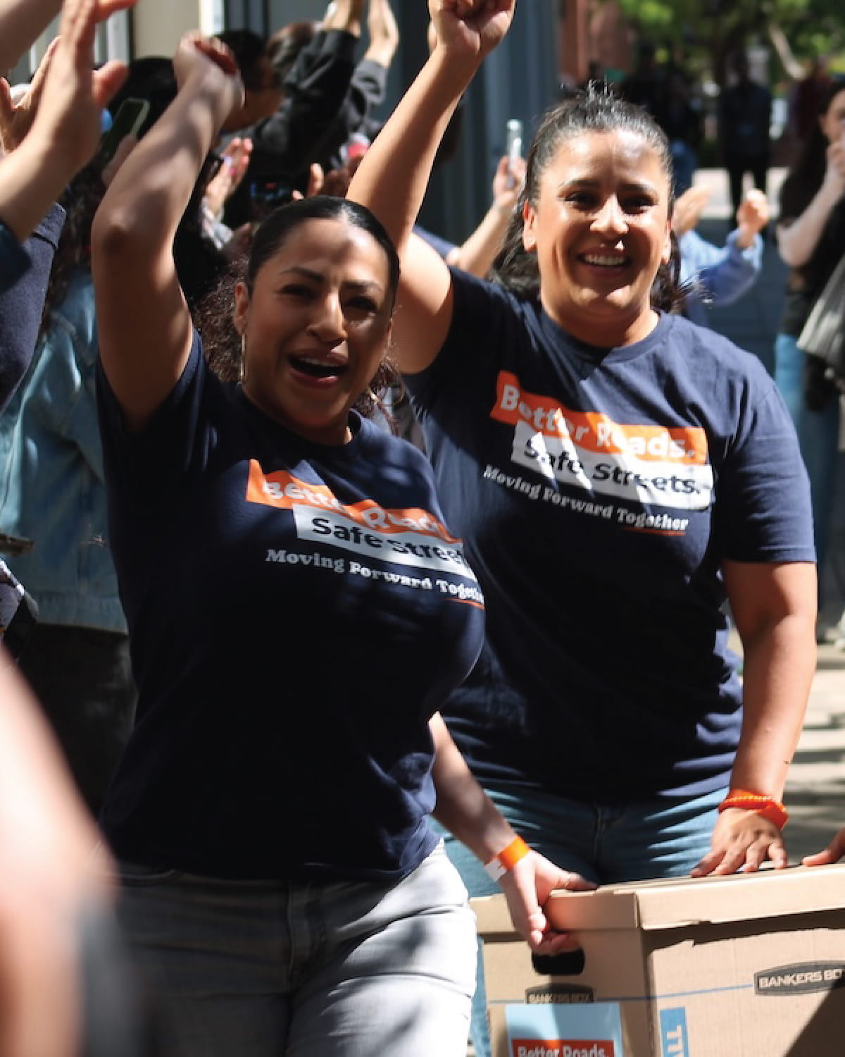 Two women wearing navy blue 